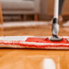 cleaning flooring with a brush