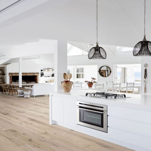 Kahrs Oak Vista in a white kitchen which is open plan.