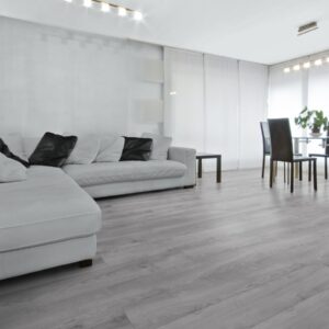 Lounge view of Kronotex Laminate Makro Oak Light Grey D3670 flooring