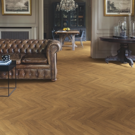 Living room view of Impressive Patterns Chevron Oak Brown flooring
