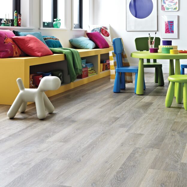 Lime washed oak flooring in a childrens play room