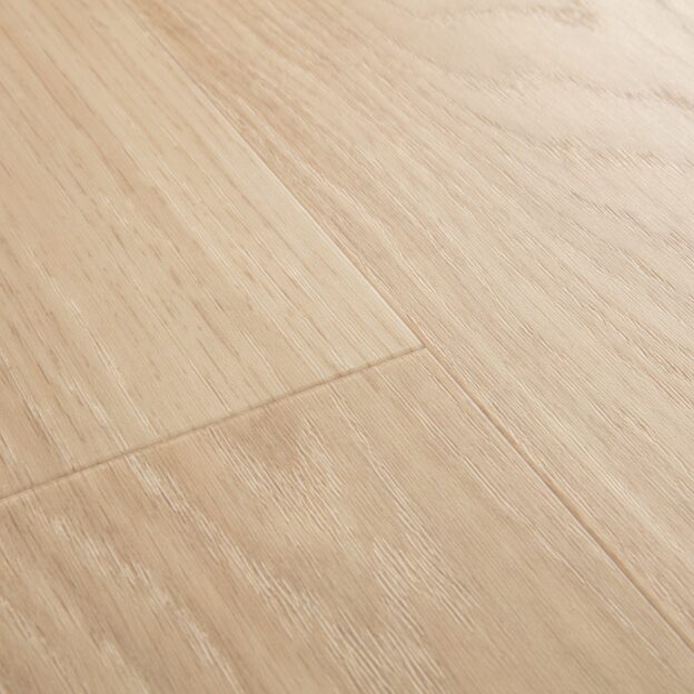 Angled close up view of Quick-Step Alpha Bloom Pure Oak Blush flooring
