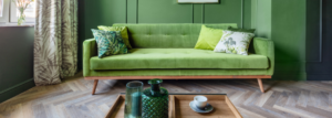 Green Interior Design in living room with herringbone flooring