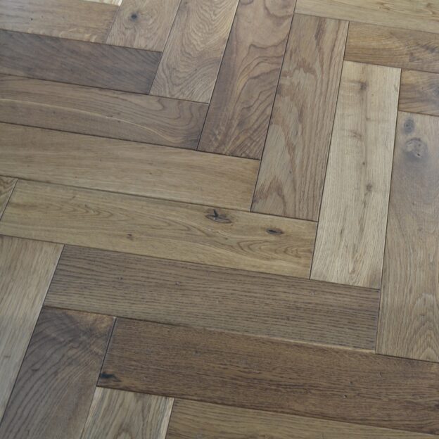 Quercia Rossa Smoked, Nail Marks & UV Lacquer Herringbone | Best at Flooring