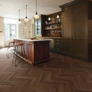 Kitchen setting with island and Nutmeg Limed Oak flooring.