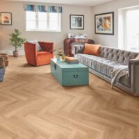 Living room with Palio Core Genna Herringbone flooring