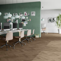 Room with Invictus Ultimus Barn Oak Parquet Saddle LVT flooring