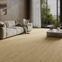 A living room with Belrose Oak Sesame plank flooring