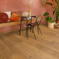 Bench and chairs with dark flooring