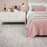Amtico White ash flooring in a bedroom