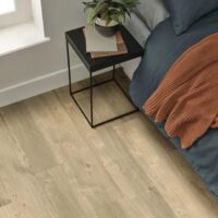 Dried willow flooring by amtico in a bedroom