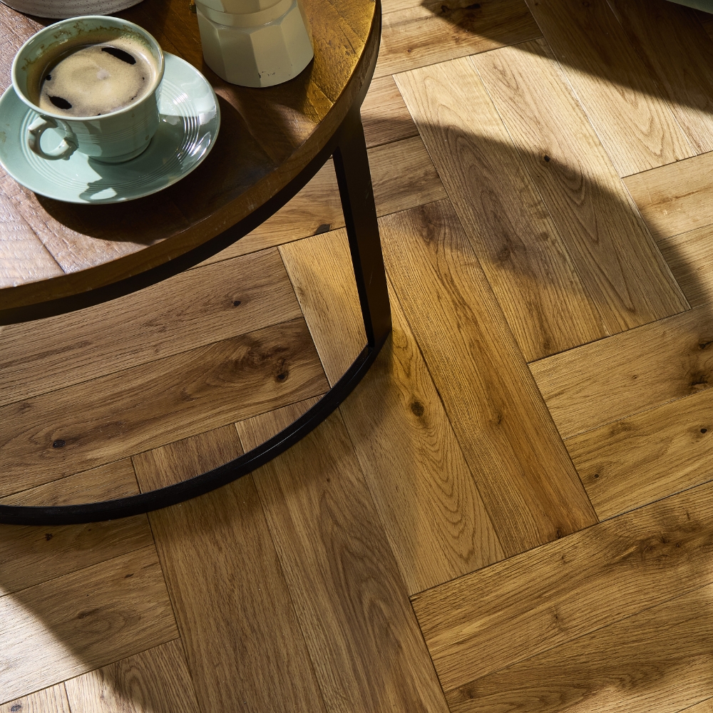 Living room with Matt herringbone flooring by Abingdon flooring